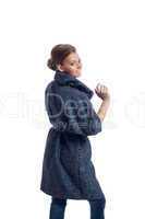 Image of smiling woman posing in fashionable coat