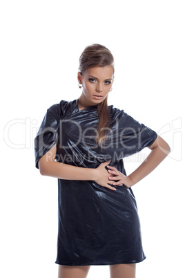 Cute young woman posing in disco dress, close-up