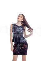 Cute model with long hair posing in trendy clothes