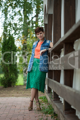 Beautiful woman with short hair posing in park