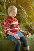 Image of smiling girl posing with cute cavy