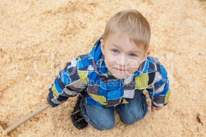 Cute little boy posing looking at camera, close-up