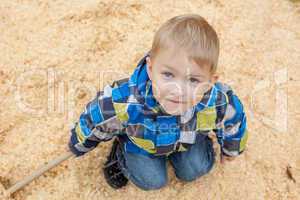 Cute little boy posing looking at camera, close-up