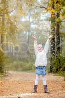 Image of enthusiastic little girl playing in park
