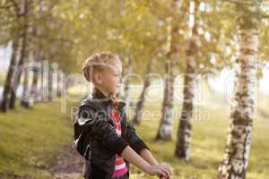 Image of adorable girl posing in birch grove