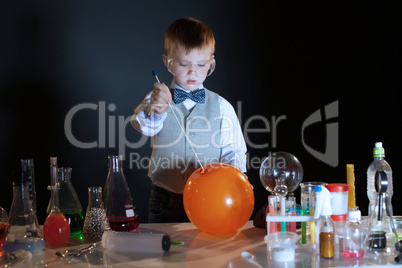 Image of concentrated pupil pierces balloon in lab