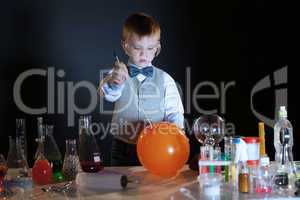 Image of concentrated pupil pierces balloon in lab