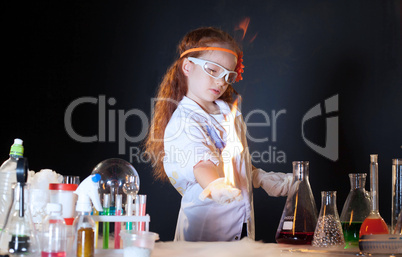 Pretty chemist working with chemicals in lab