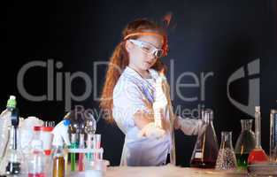 Pretty chemist working with chemicals in lab