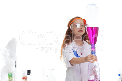Adorable girl watching reaction of reagents