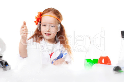 Adorable girl doing experiment, isolated on white