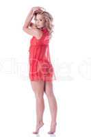Image of flirting slender girl in red negligee