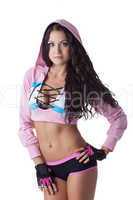 Portrait of hot sporty brunette looking at camera