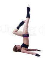 Graceful athletic girl doing stretching in studio