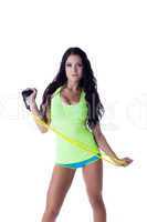 Sexual fitness trainer posing with skipping rope