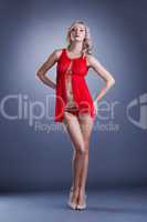 Elegant slim model shows red sexy lingerie