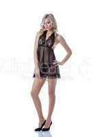 Sexual young model advertises black lacy negligee
