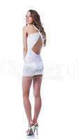 Pretty brunette posing in white short dress