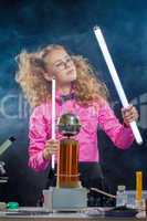 Image of ingenious girl conducting experiment