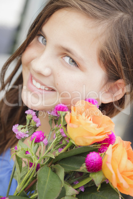 pretty young girl holding flower bouquet at the market