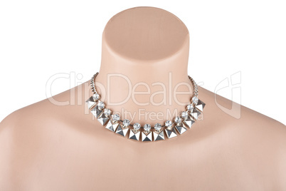 Beautiful silver statement necklace on mannequin isolated on whi