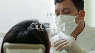 2of19 Dentist visiting patient in dental studio, oral hygiene, health