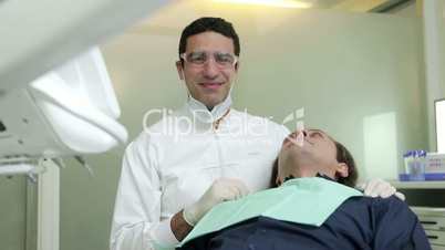 5of19 Dentist visiting patient in dental studio, oral hygiene, health