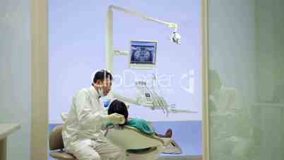 11of19 Dentist visiting patient in dental studio, oral hygiene, health