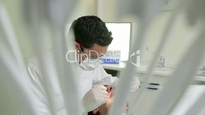16of19 Dentist visiting patient in dental studio, oral hygiene, health