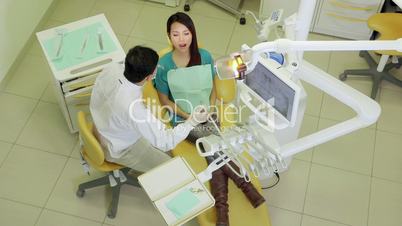 18of19 Dentist visiting patient in dental studio, oral hygiene, health