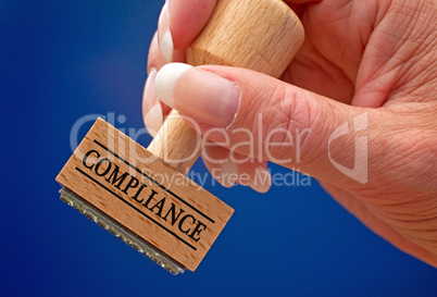 compliance stamp with female hand