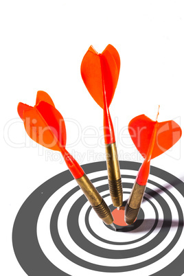 three red darts in a dart board