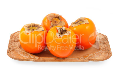 Persimmon on a plate