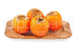 Persimmon on a plate