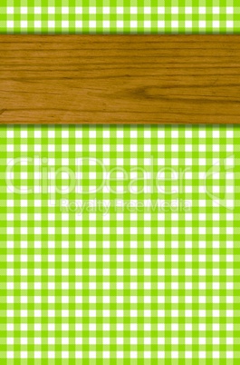 Tischdeckenmuster grün weiß mit Holzbrett