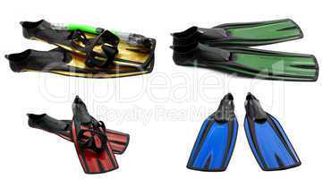 set of multicolored swim fins, mask and snorkel for diving