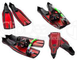 set of red flippers, mask, snorkel for diving with water drops