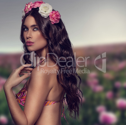 exotic woman with flowers in her hair