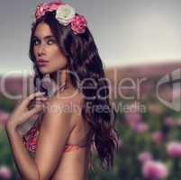 exotic woman with flowers in her hair