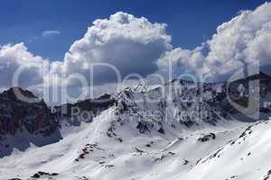 snowy mountains and blue sky with cloud in sun day