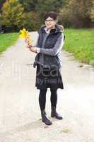 woman alone in the autumn walk