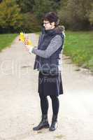 woman alone in the autumn walk