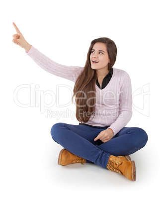young woman pointing up