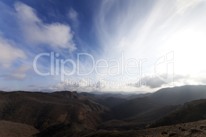 mountains and blue sky with clouds