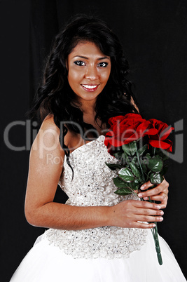 bride with red roses.