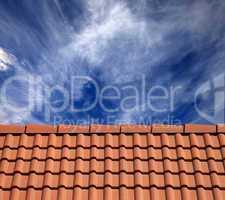 roof tiles and sky with clouds at sun day