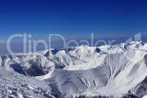 view on off-piste slopes and blue sky