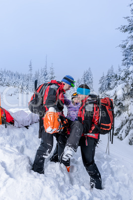 ski patrol carry injured woman skier stretcher