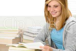 smiling student girl reading book