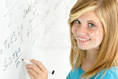 student teenage girl write mathematics white board